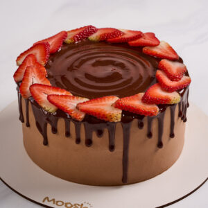 Alternative view of volcán de chocolate con fresas